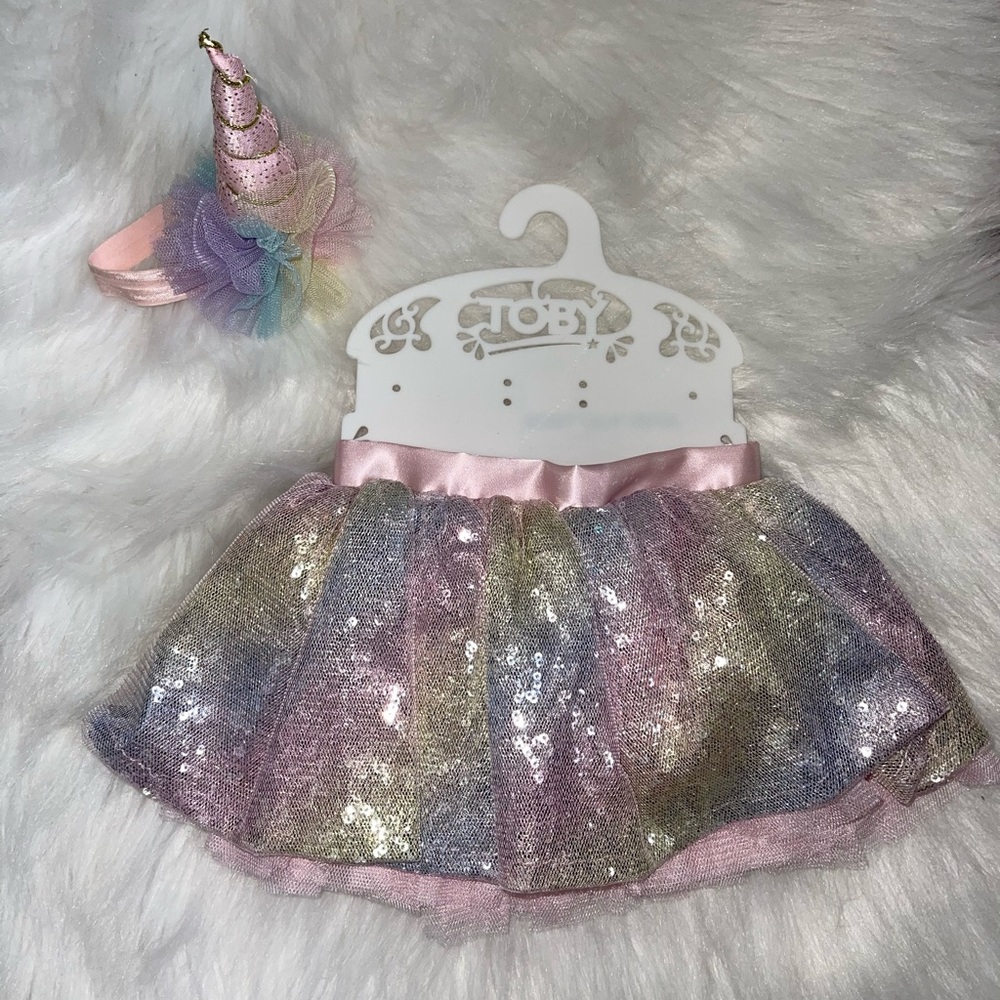 Rainbow tutu with a matching unicorn horn headband